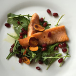 Salt-Seared Salmon Belly with Sweet Potato Chips, Arugula & Pomegranate Seeds
